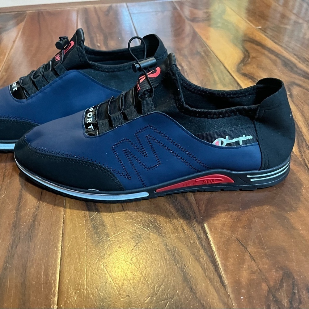 NWOT champion R sport black and navy athletic shoes. Measurements 11 1/2”